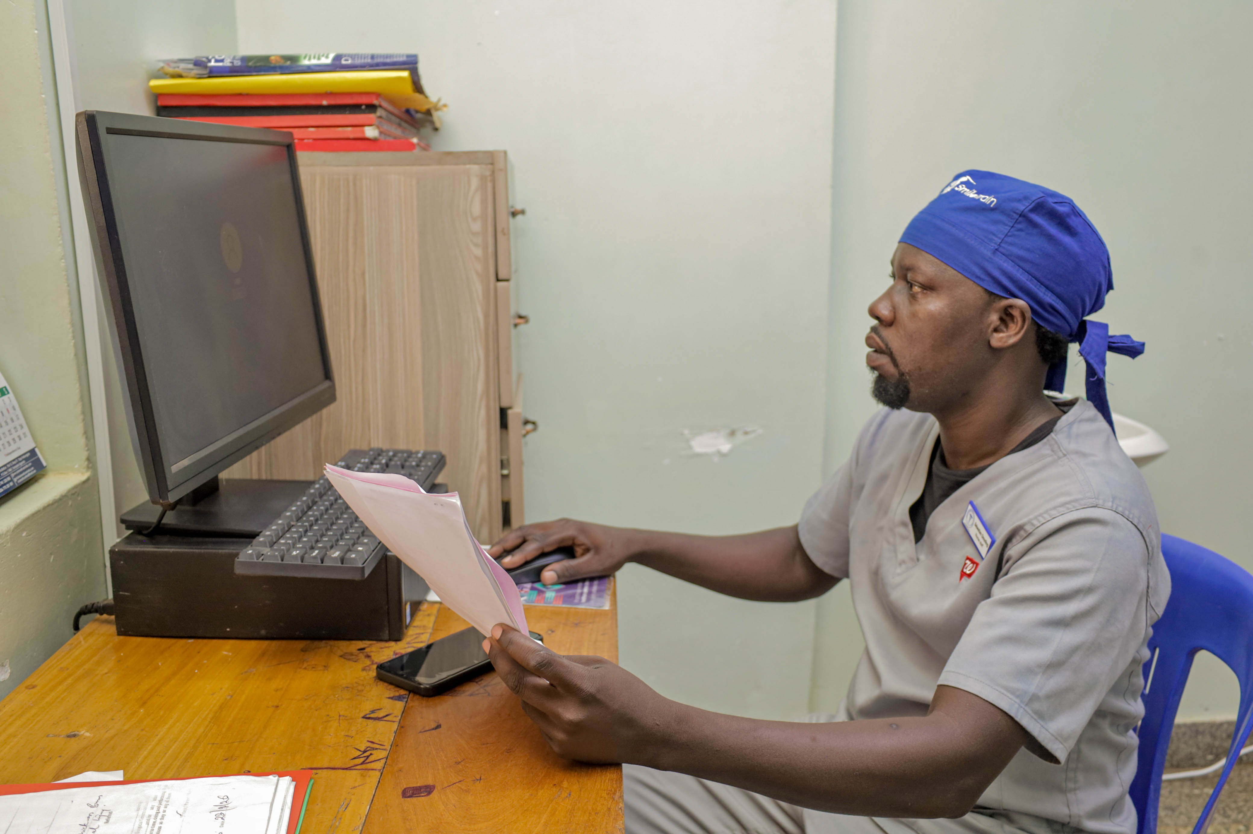 Trinity clinician reviewing diagnostic imaging